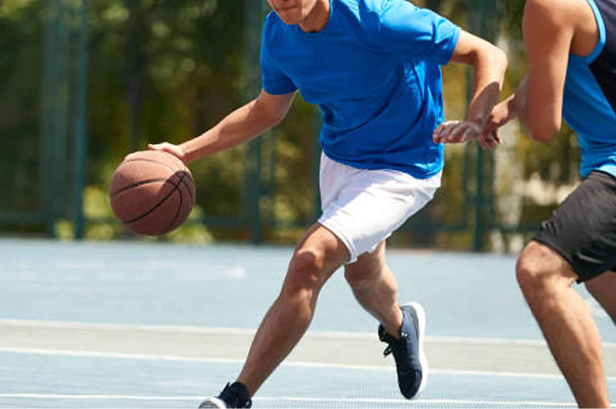 a man playing basketball