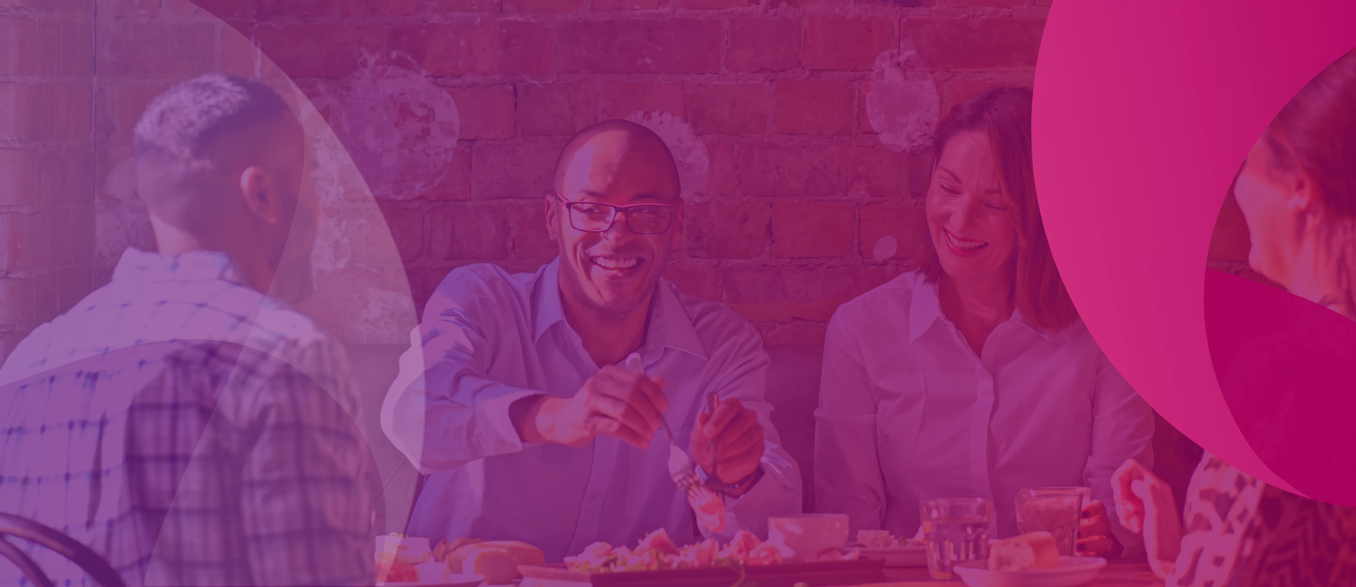 a group of people sitting at a table