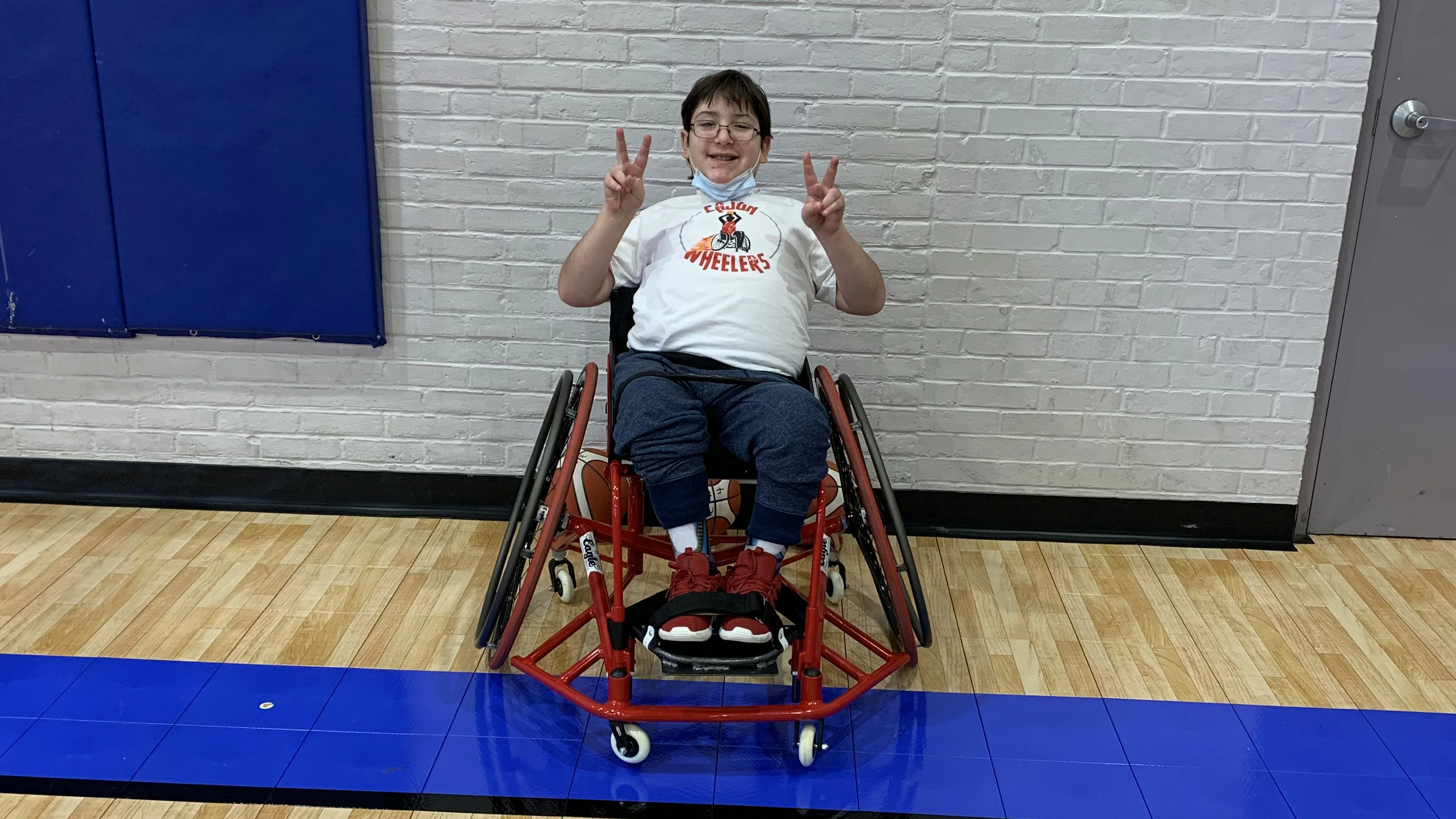 Eli on a basketball court