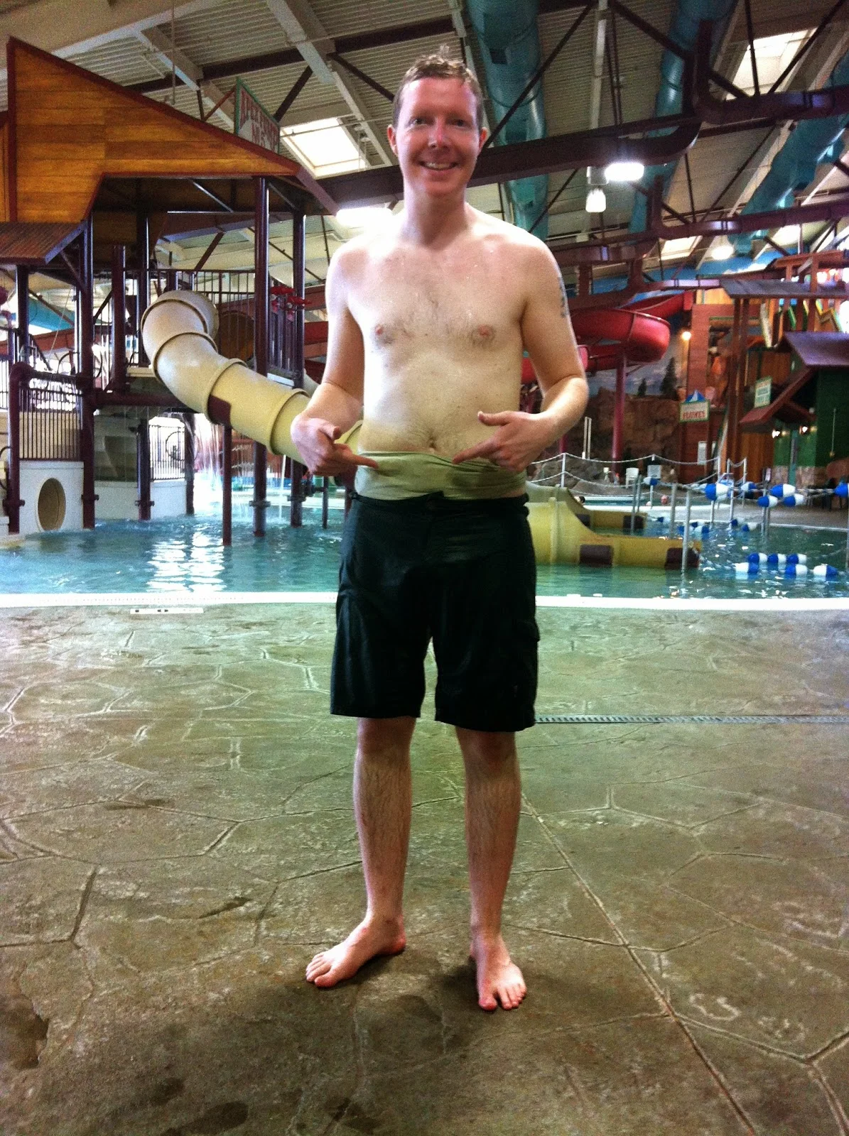 man with an ostomy belt at a swimming pool