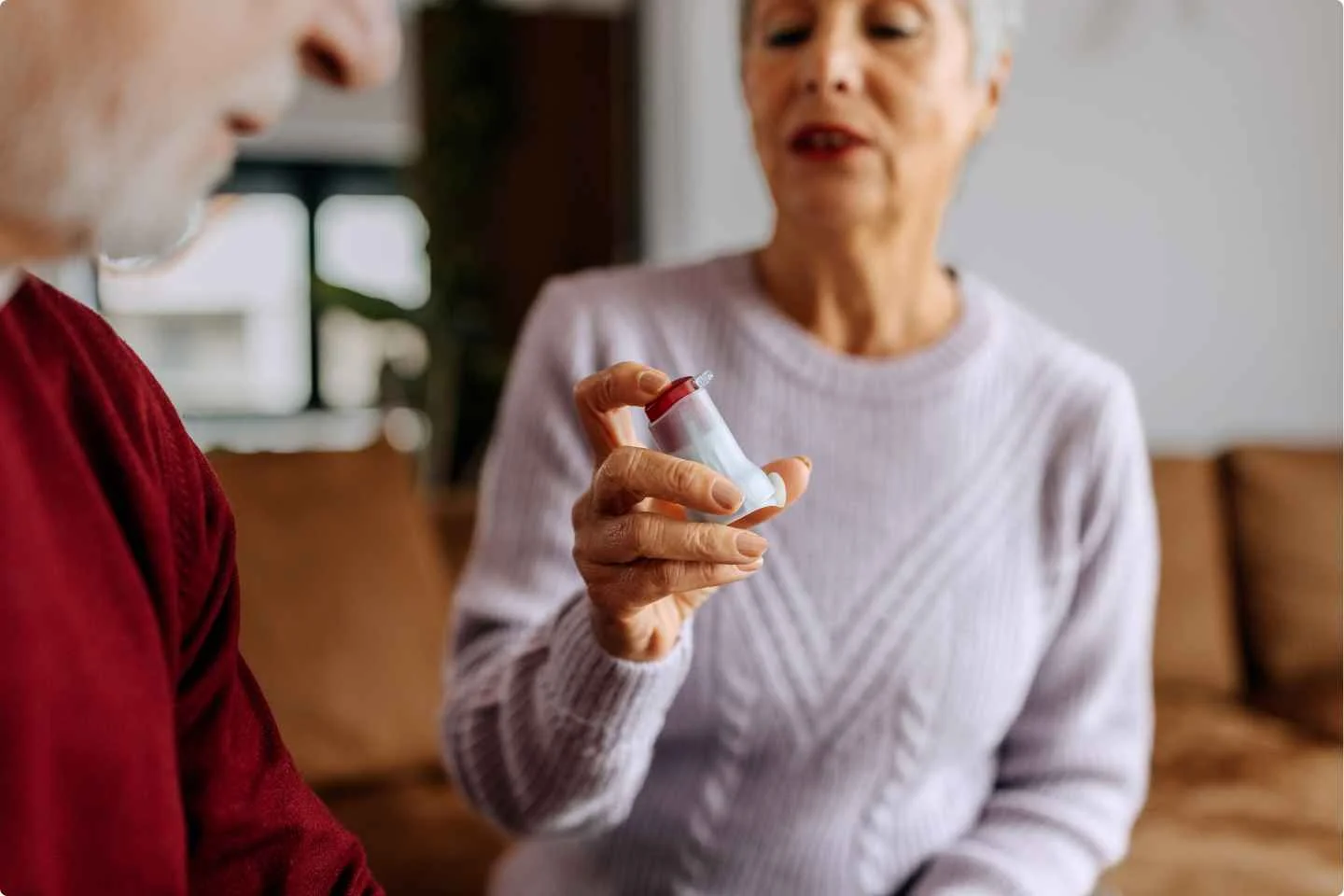a person holding a white object